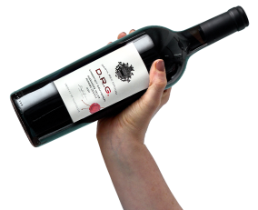 Hand holding a bottle of wine